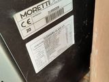 a label that says moretti design on the side of a machine
