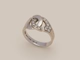a close up of a ring with diamonds on a white background