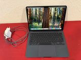 an image of a laptop computer sitting on top of a red table