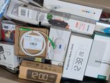 a box full of electronic devices and other electronics