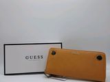 guess long wallet in tan leather with a card holder