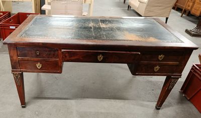 a wooden desk with two drawers and a metal top