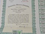 a certificate on a table with stamps on it