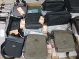 a lot of bags that are sitting on a table