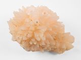 a small cluster of crystals on a white surface