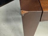 three pieces of wood stacked on top of each other