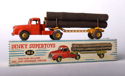a toy truck with a load of logs on the back of it