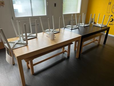 a long table with a bunch of candles on top of it