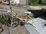 a bike that is parked on the side of the road