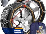 a pair of snow chains with a pair of gloves next to them