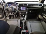 the interior of a car with a steering wheel, dashboard, and dash board