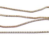 a close up of a chain on a white surface