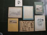 a lot of drawings on the floor of this room