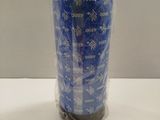 a roll of blue wrapping on a white table