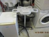 an image of a laundry room with a washer and dryer
