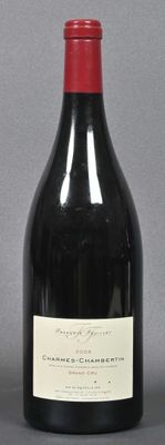 a bottle of wine that is sitting on a table