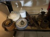 a shelf that has a lot of items on it