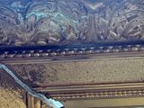 a picture of a gold frame with a mirror in it