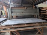 a large machine that is sitting in a warehouse