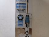 the box of a steam mop sitting on top of a counter