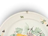 a plate that has a picture of a bug on it