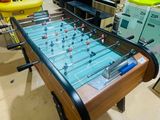a foosball table in the middle of a room