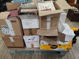 boxes stacked on top of each other on a cart in a room