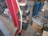 a picture of a machine that is sitting in a garage