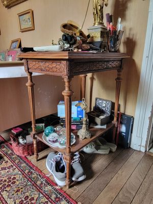 a small table with a lot of stuff on top of it