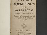 an old book with a black and white title on it