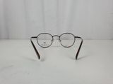 a close up of a pair of glasses on a table