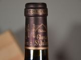 a bottle of wine that is sitting on a table