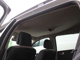 a car that is sitting in the back seat of the truck