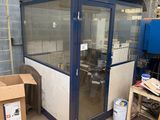 an image of a room with a glass door and a box of boxes