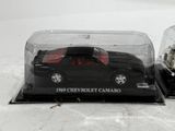 a black car and a black car in a clear case