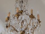 a chandelier hanging from the ceiling in a room