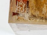 a glass block with a clock inside of it