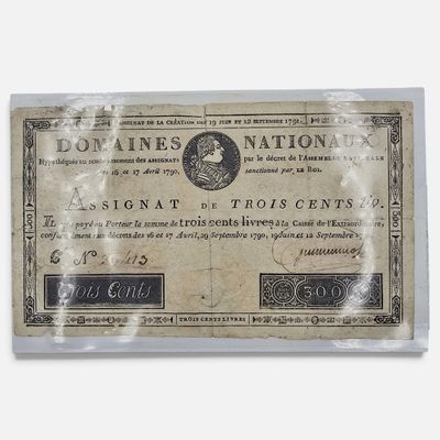 un ancien billet de banque sur lequel figure le portrait d'un homme