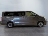 an image of a silver van parked in a garage