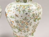 pair of chinese vases with birds and flowers painted on them