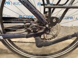 a close up view of a bicycle ' s front wheel