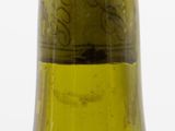 a close up of a bottle of wine on a table