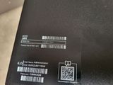 an image of a close up of a cell phone with a qr code on the back of it