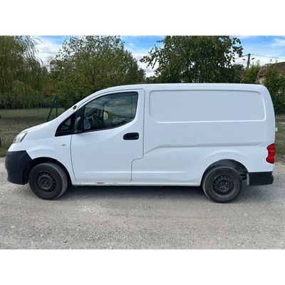 a picture of a white van parked in a parking lot