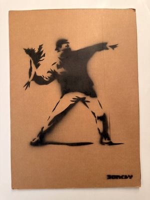 painting of a man throwing a bird on a cardboard box