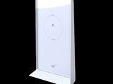 une image représentant un appareil électronique blanc sur fond noir
