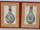 two framed pictures of vases on a wall in front of a house