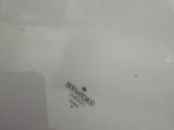 a close up of a white plate with a black and white design on it