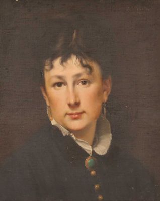 portrait of a woman in a black coat and white collared shirt
