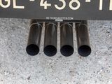 a close up of a number plate on a car